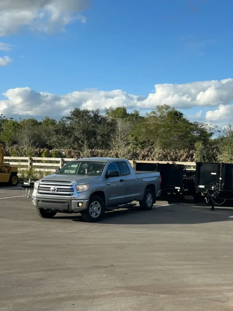 Loaded dump trailer full of junk by the junk removal company On-Call Hauler in Palm Beach County.