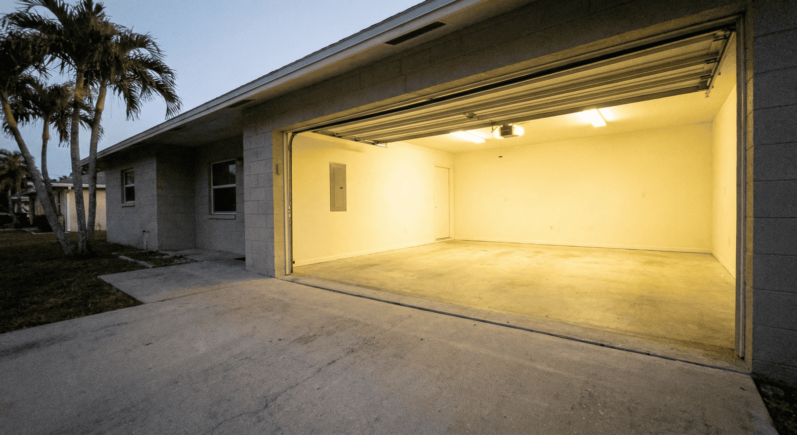 Clean empty garage after junk removal by On-Call Hauler in Palm Beach County