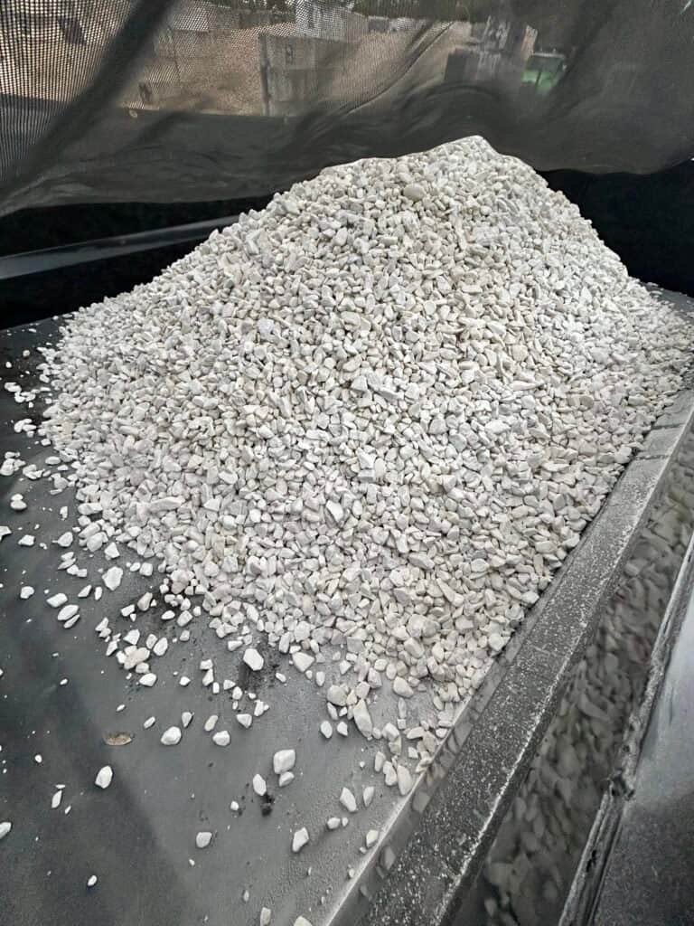 Crushed white marble rock delivery in Palm Beach County Florida by On-Call Hauler