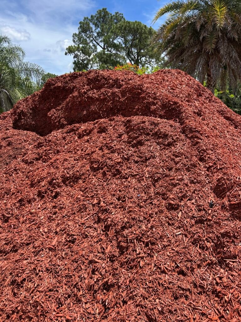 Bulk mulch delivery in Palm Beach County FL by On-Call Hauler dump trailer.