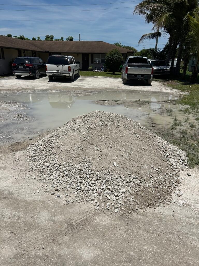 Bulk fill dirt and aggregate delivery in Palm Beach County FL by On-Call Hauler dump trailer.