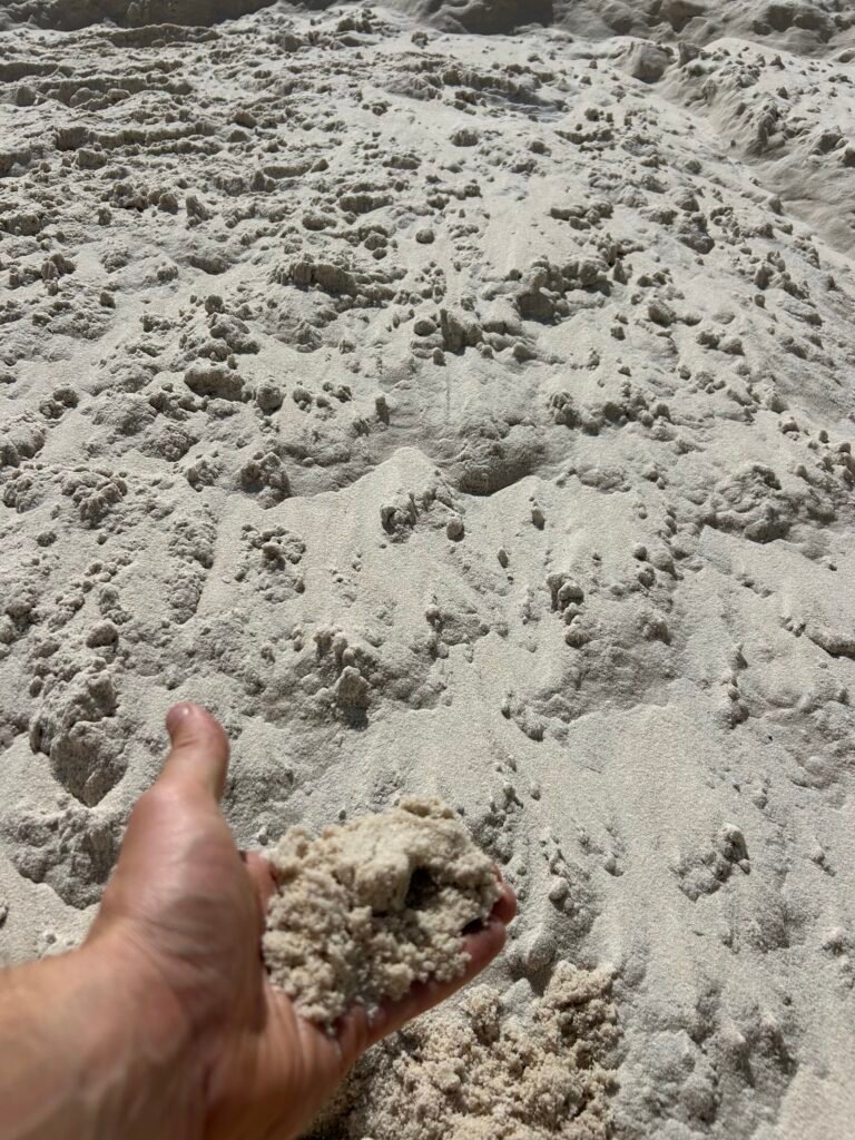 Bulk sand delivery in Palm Beach County FL by On-Call Hauler dump trailer.