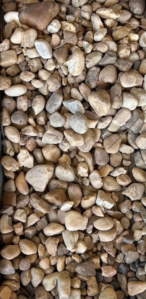 Medium Brown River Rock delivery by On-Call Hauler